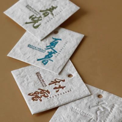 China 2021 Viable Paper Label Embossed Package Envelopes And Hang Tags Garment Hair Hangtag With Cheap Price à venda