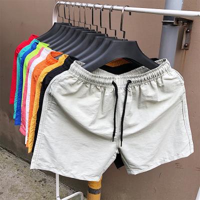 China Custom logo 2022 new summer breathable men's casual candy color shorts five-cent pants men's ten-color foreign trade beach pants for sale