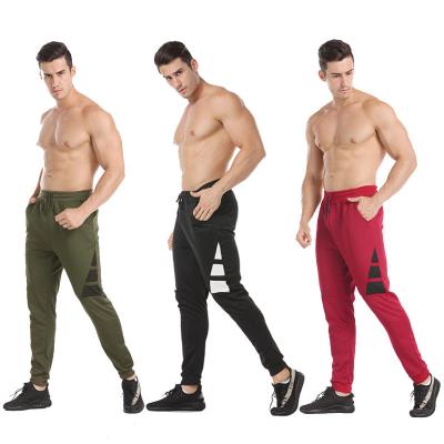 China Wholesale Price Mens Breathable Fitness Sports Casual Pants Fashionable Polyester Sweatpants Loose Elastic Knitted Pants Joggers Pants for sale