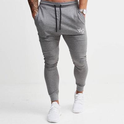 China Costom Logo New Solid Color Men's Breathable Joggers Joggers Sweatpants Sports Loose Breeches Fitness Pants Trousers For Men for sale