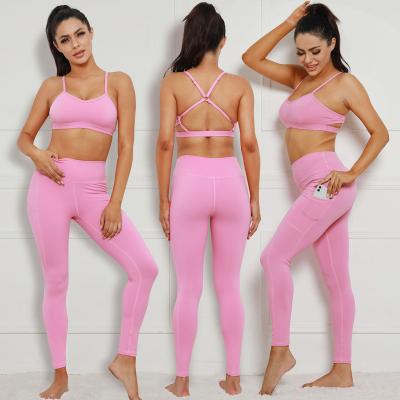 China Breathable Womens Yoga Teams 2 Piece High Waisted Nylon Leggings With Sports Bra Two Piece Workout Set Gym Clothing Sets for sale