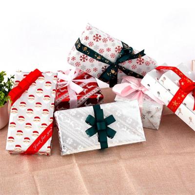 China Recycled Materials Wholesale Custom Printed Christmas Snowflake Elk Bag Logo Book Cover Paper Gift Wrapping Wrapping Paper for sale