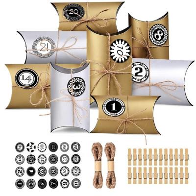 China Recyclable Custom Christmas Gift DIY 24pcs Gold Ribbon Candy Box Advent Calendar Pillow Box with Sticker and Rope for sale