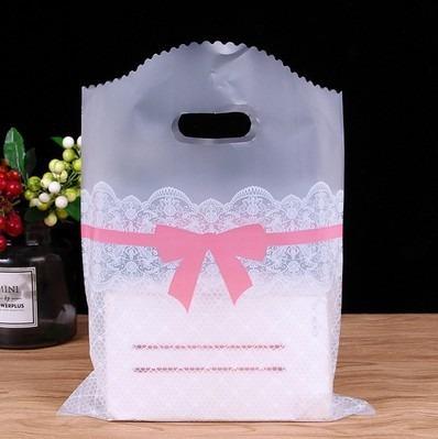 China Custom Plastic Gift Portable Shopping Bag Moisture Proof With Logos Jewelry Clothing Packaging Bags With Handle for sale