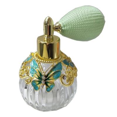 China Eco-friendly Recyclable Wholesale Dubai Arab Middle East Country Butterfly 50ml Essential Oil Sub-bottling Perfume Bottle With Air Bag for sale