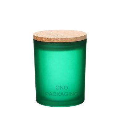 China Gift & Empty Craft ONO 7.5 Ounce Frost Emerald Green Glass Candle Jar Candle Container with Airtight Bamboo Lid for sale