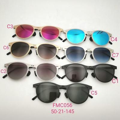 China Fashion Trendy Oval Round Super Thin Metal Folding Sunglasses Polarized Women Men Foldable Sunglasses for sale