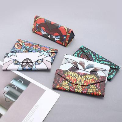 China Fashionable Custom Triangle Logo Sunglass Case Animal Folding Glasses Case Leather Eye Wear Packaging Box for sale