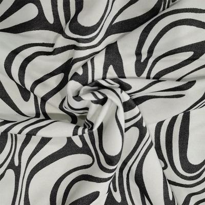 China Double Faced High Quality Black And White Zebra Jacquard Woven Fabric Printing Apparel Fabric for sale