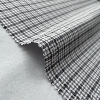 China Other hot selling yarn dyed check stretch fabric polyester woven stocklot clothing for sale