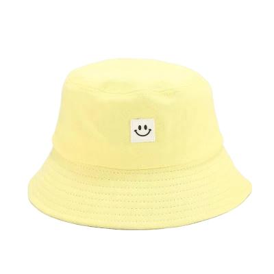 China Character Fashionable Smile Fisherman Hat Cotton Lady Art Sunblock Beach Hat Folding Beautiful Character for sale