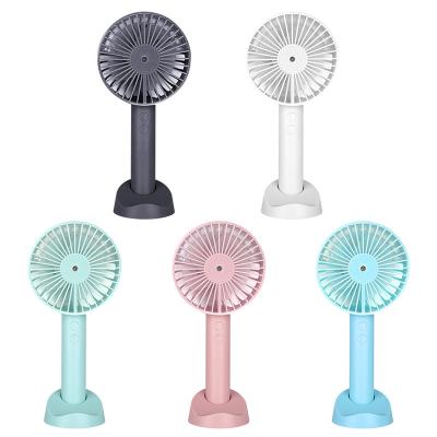 China 2021 New Big Battery Air Cooling +Moisturizing Portable 3 Speed ​​Travel Desktop Hand Held Cool Air Fan Small Water Spray Mist Mini Fan with Phone Holder for sale