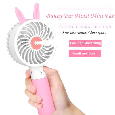 China Air Cooling Small Small +Moisturizing Outlet Handheld Travel Spray Portable Mini Fan Cute Bunny Ear Water Mist Stand Fan for sale