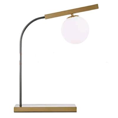 China Modern creative simple living room table lamp desk lamp wrought iron bedroom bedside lamp for sale