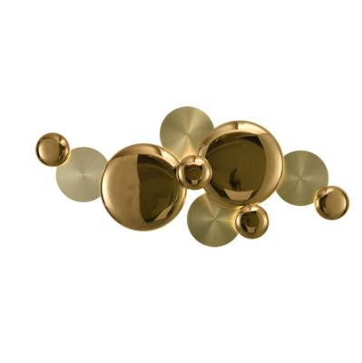 China Metal round combination design living room background Nordic creative gold wall lamp for sale