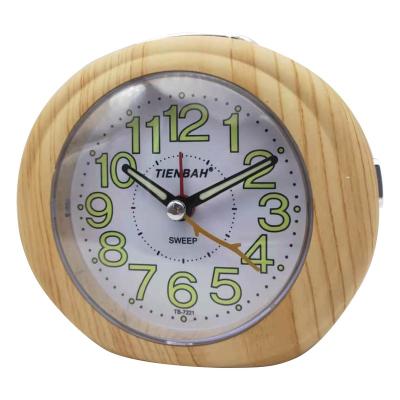 China Antique Style Wave Motion Melody Wake Up Light Wooden Table Alarm Clock for sale