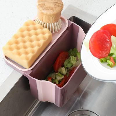 China Kitchen CL102 Kitchen Sink Drain Basket Retractable Multifunctional Plastic Drain Rack Hanging Waste Filter Basket Holder for sale