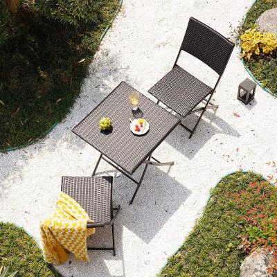 China Other Stainless Steel Rainproof Frame Foldable Garden With Chairs Rattan Dining Table for sale