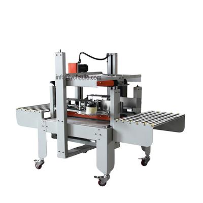 China Automatic CLOTHING Flap Carton Sealer Adhesive Tape Carton Box Sealing Machine for Factory Assembly Line for sale