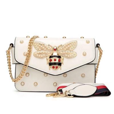 China Fashion Banquet Designer Crossbody Chain Small Shoulder Bag Luxury Simple Cross Strap PU Leather Lady Unique Ladies Shoulder Bag for sale