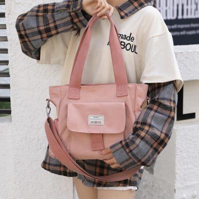 China New Waterproof Women's Multi Layered One Shoulder Messenger Bags Lightweight Nylon Women Bag Large Capacity Shoulder Bag for sale