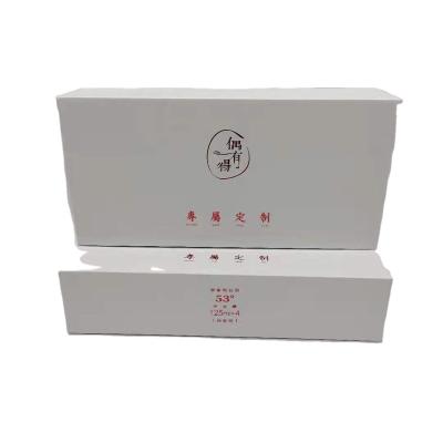 China Handmade Bespoke White Apparel Packing Gift Packaging Magnetic Folded Paper Box With Custom Logo for sale