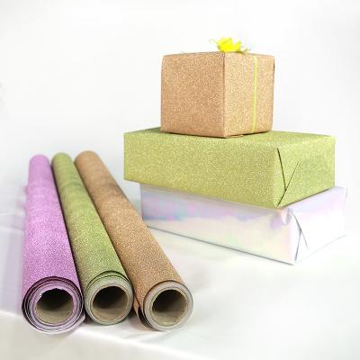 China ANTI-STATIC Custom Design Colorful Paper Rolls Glitter Powder Printing Christmas Gift Wrapping Paper for sale