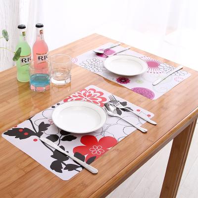 China Sustainable Fashion Custom Flowers Rectangular Pattern Heat Pad PP Place Mat Printing Plastic Place Mat for sale