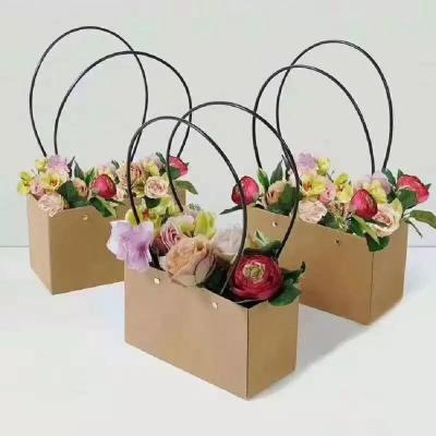 China Recyclable Custom Florist Supplies Kraft Paper Bag With Handles Waterproof Flower Pot Inside for sale