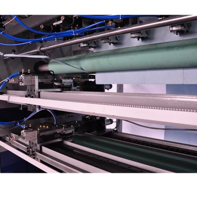 China Instead of the traditional technology factory supply textile fabric roll fabric ultrasonic sewing cutting machine directly for sale