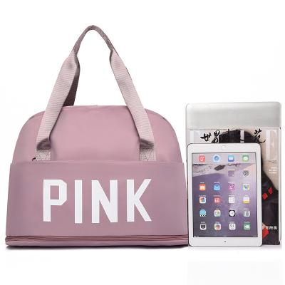 China New fashion travel bag hot pink outdoor waterproof multifunctional travel bag unisex fitness sports bag for sale