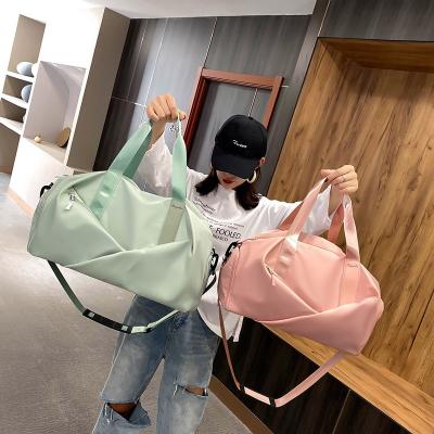 China Fashionable Environmental Protection Portable Travel Bag Wet And Dry Separation Sports Bag Waterproof Women's Luggage Bag for sale