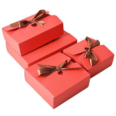 China Recyclable Wholesale Cardboard Magnetic Packaging Red Gift Boxes With Ribbon Closure for sale