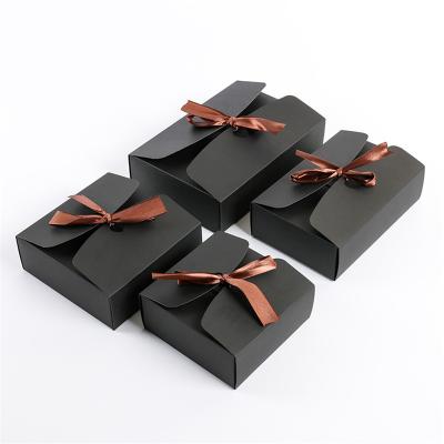 China Recyclable Custom Colored Packaging Cardboard Magnetic Paper Gift Box With Ribbon for sale