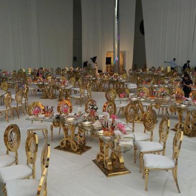 China EUROPEAN Luxury Circle Back PU Cushion Gold Stainless Steel Chiavari Phoenix Chair For Wedding Reception for sale