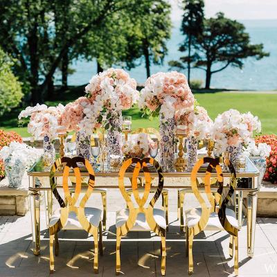 China EUROPEAN luxury leather flower frame SS gold metal PU back chairs for events stainless steel wedding chair for sale