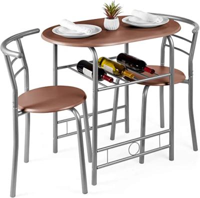 China (Other) Hot Selling Adjustable 3 Piece Modern Steel Frame Wood Top Oval Small Kitchen Dining Table And Chair Set for sale