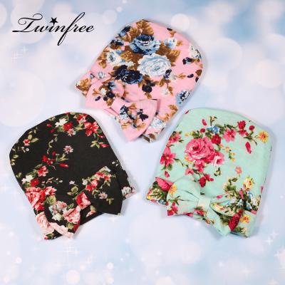 China Wholesale Newborn Flower Bow Baby Hat Soft Cute Flower Print Bow Breathable Hat for sale