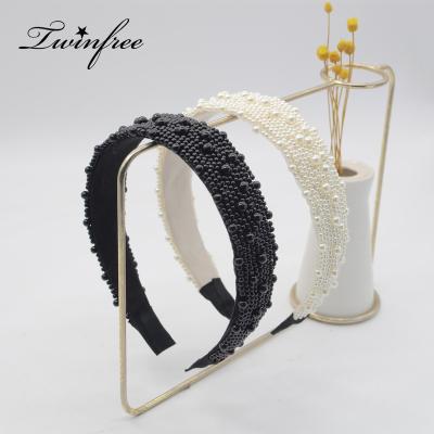 China Black White Pearl Headband For Women Girl Drop Shipping Designer Headband For Girls Women Soft Luxury Black White Circle Hair Pearl Headband for sale