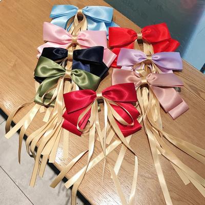 China Korean popular hair clip flame flame hairpin satin hair clip Korean popular hair clip new trend for women girl big bow silk hair accessories for sale