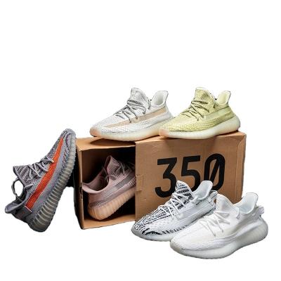 China CUSHIONING Yeezy 350 Breathable Pulsating Tennis YEEZY 350 Casual Running Shoes Logo Shock Absorption Sneakers Men And Women Brand V2 for sale