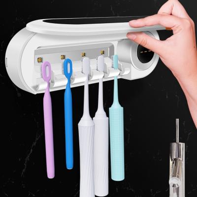 China 2020 New USB Automatic Sterilization 99.9% UVA Disinfection Toothbrush UV-C Sterilizer White Rechargeable Toothbrush UV-C Cleaner Holder ABS+PC for sale