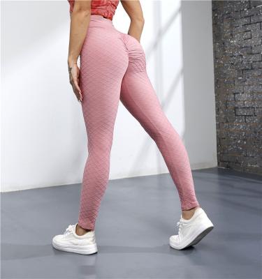 China Ladies Leggings Breathable Solid Color Hot Selling Soft Yoga Pants Seamless Design Leggings for sale