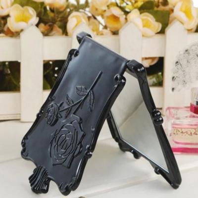 China Personalized New Design 4 Color Antique Vintage Embossed Rose Plastic Standing Folding Makeup Mirror for sale