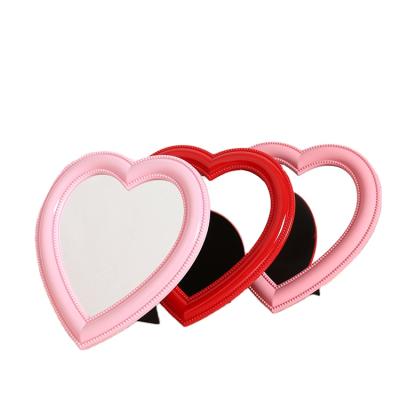 China Personalized Girly Princess Mirror Vanity Mirror Fashion Series Heart Shape Korean Pink Desktop Mirror Makeup Wholesale for sale