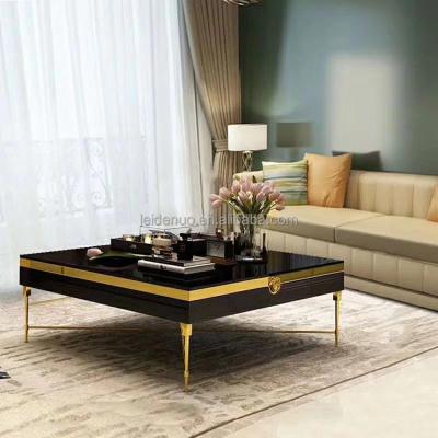 China Modern design stable luxury gold polished tempered glass top rectangle stanieless steel coffee table for sale