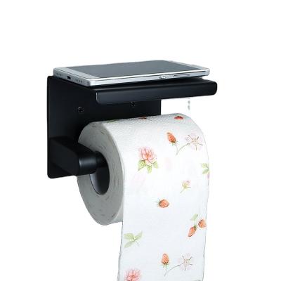 China Black Wall Mounted Tissue Roll Holder Wall Mounted Towel Rack With Cell Phone Shelf Bathroom Toilet Paper Holder for sale