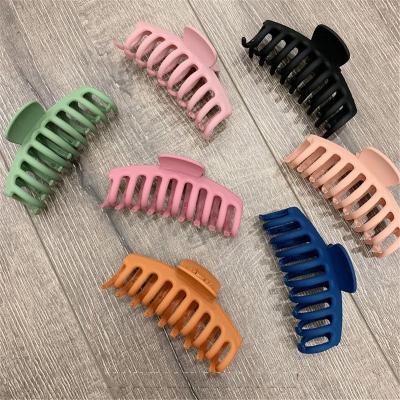 China Solid Color Ladies Hair Claws Solid Color Large Hair Claws Stylish Frosted Acrylic Hair Clips Candy Scrub Makeup Bath Hair Claws For Women for sale