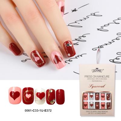 China Easy Apply NEWAIR Heart Pattern Red Short Square Nail Tip Full Cover Artificial Fake Nail Press On Nail With Fake Stone for sale