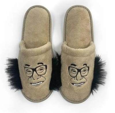 China Damping 2021 Famous Adults Shoes Solid Color Winter Cartoon Face Slippers Designer Unisex Warm Indoor Home Slippers for sale